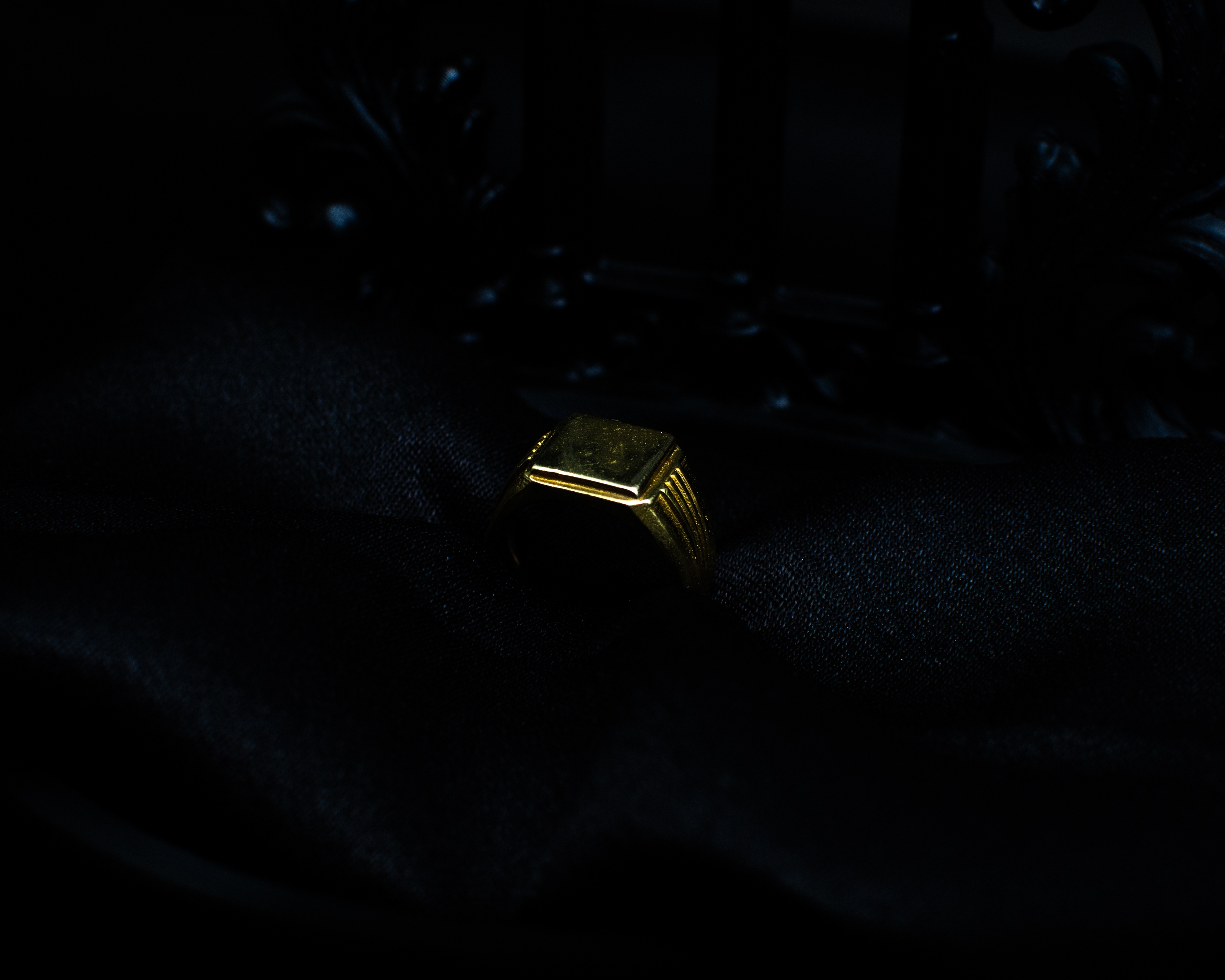 Panchadhatu Signet Ring 1 support view on black satin