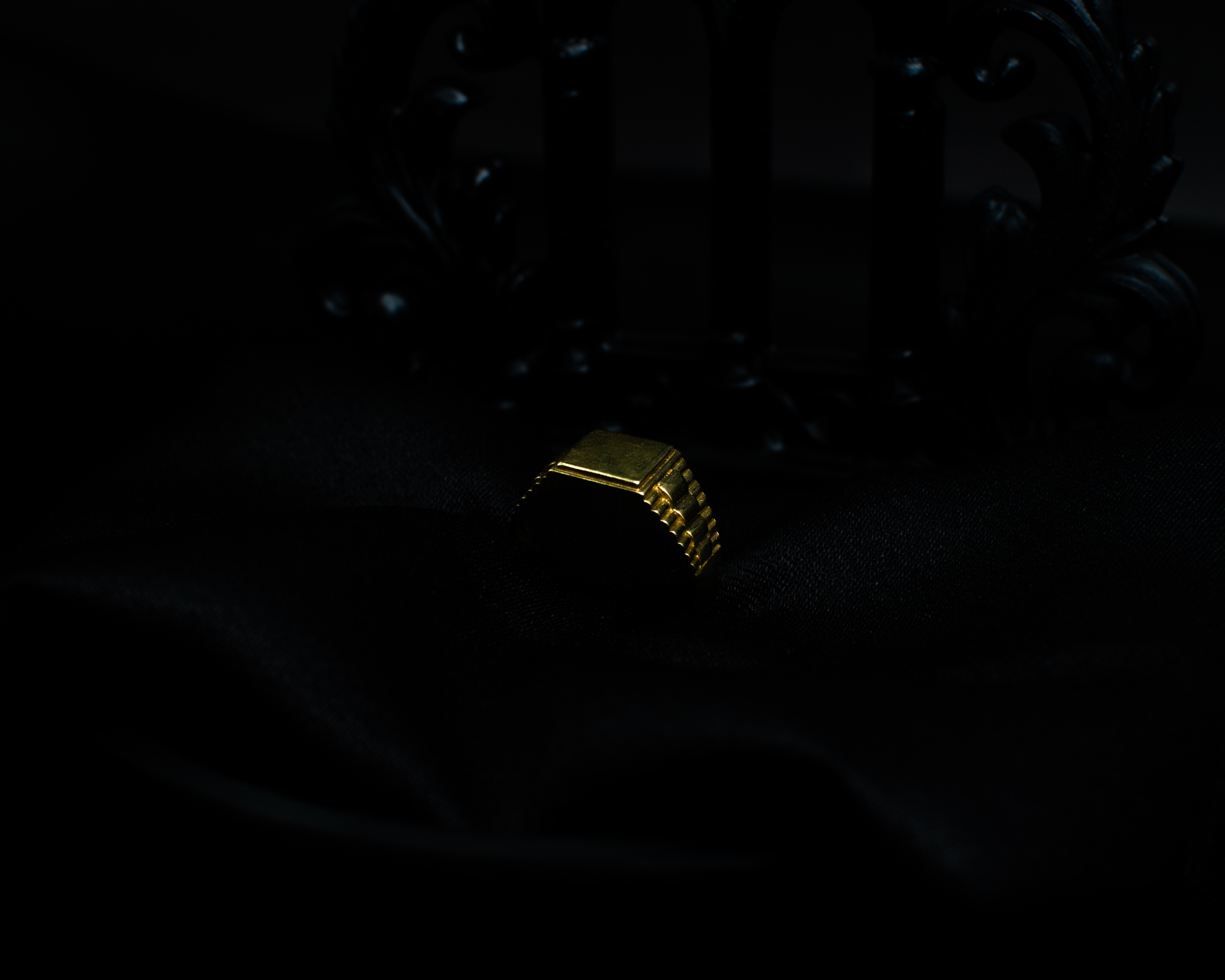 Panchadhatu Signet Ring 3 support view on black satin