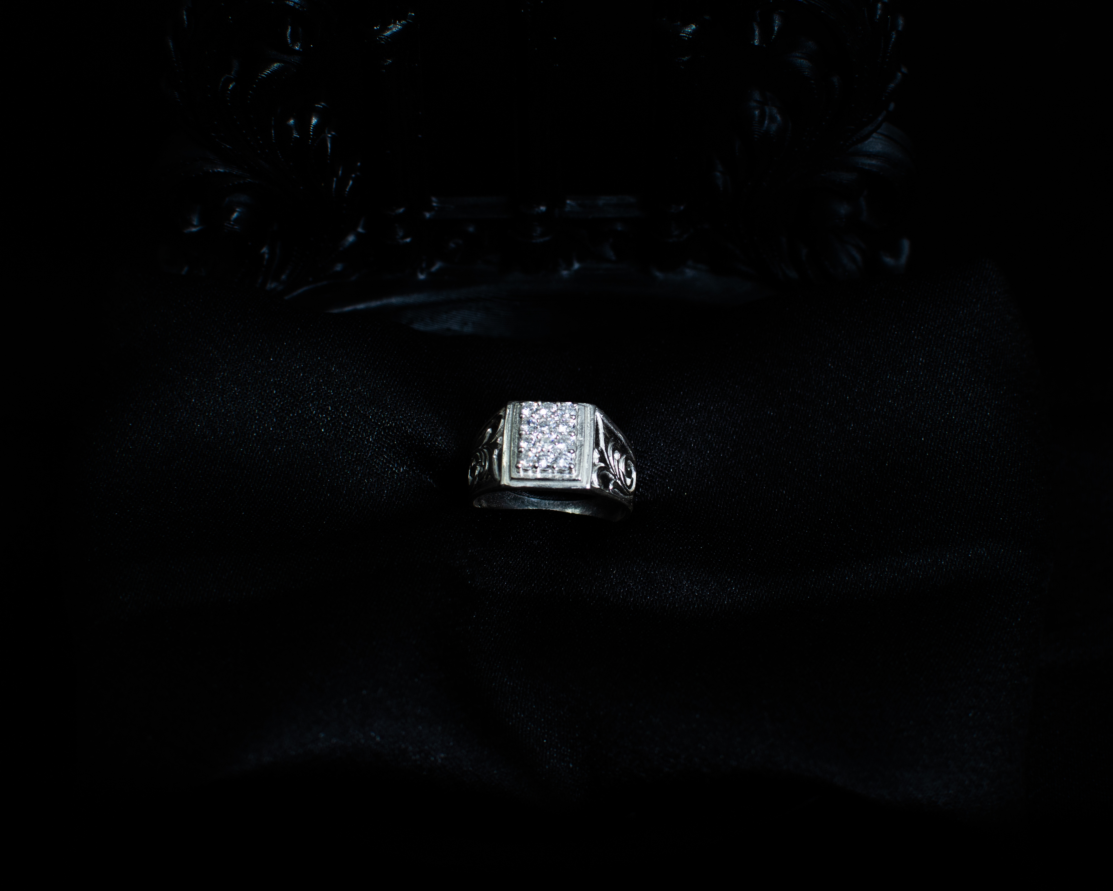 Silver Square Ring angled view showing carved side detail