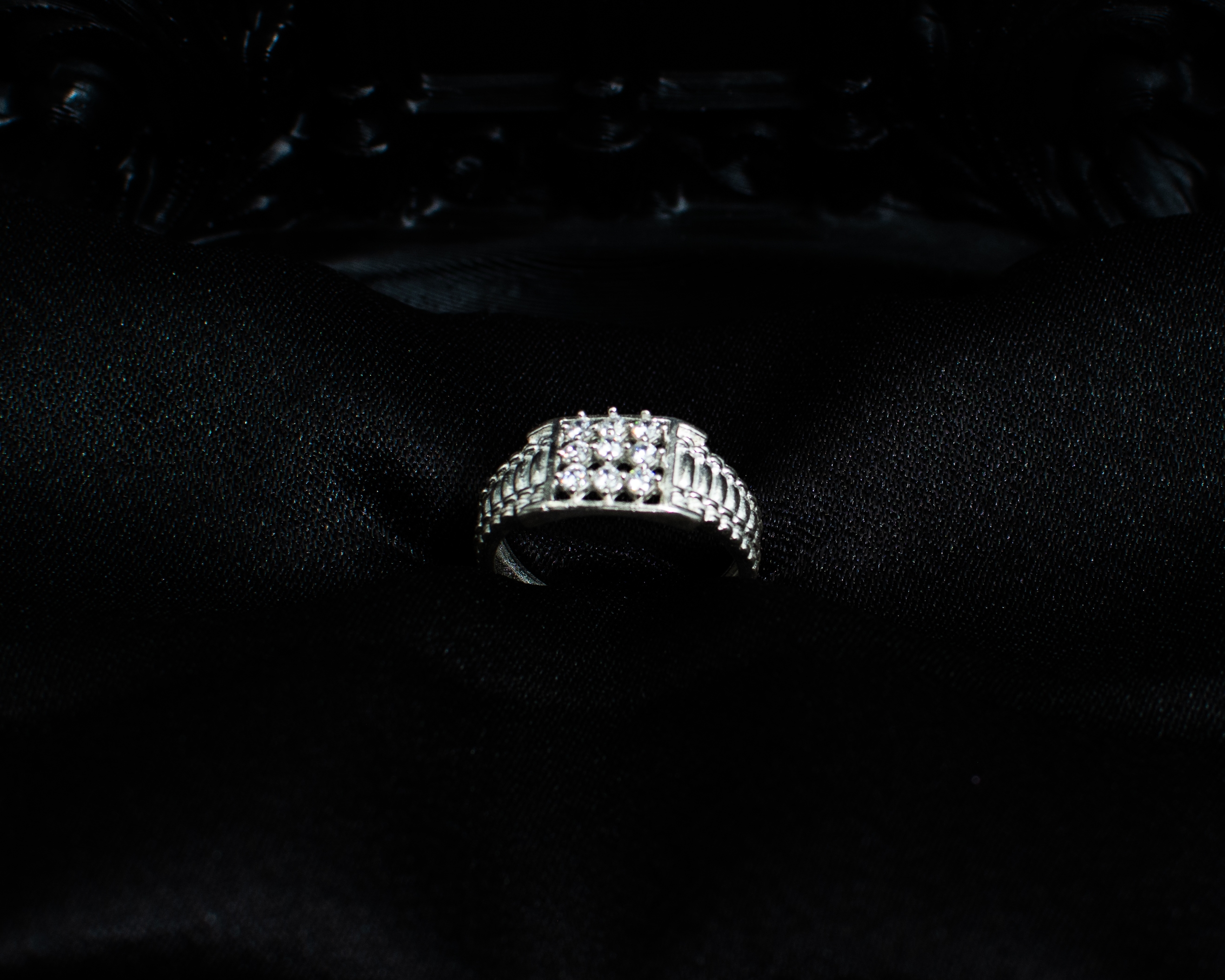 Ring 8 view 2 on black satin