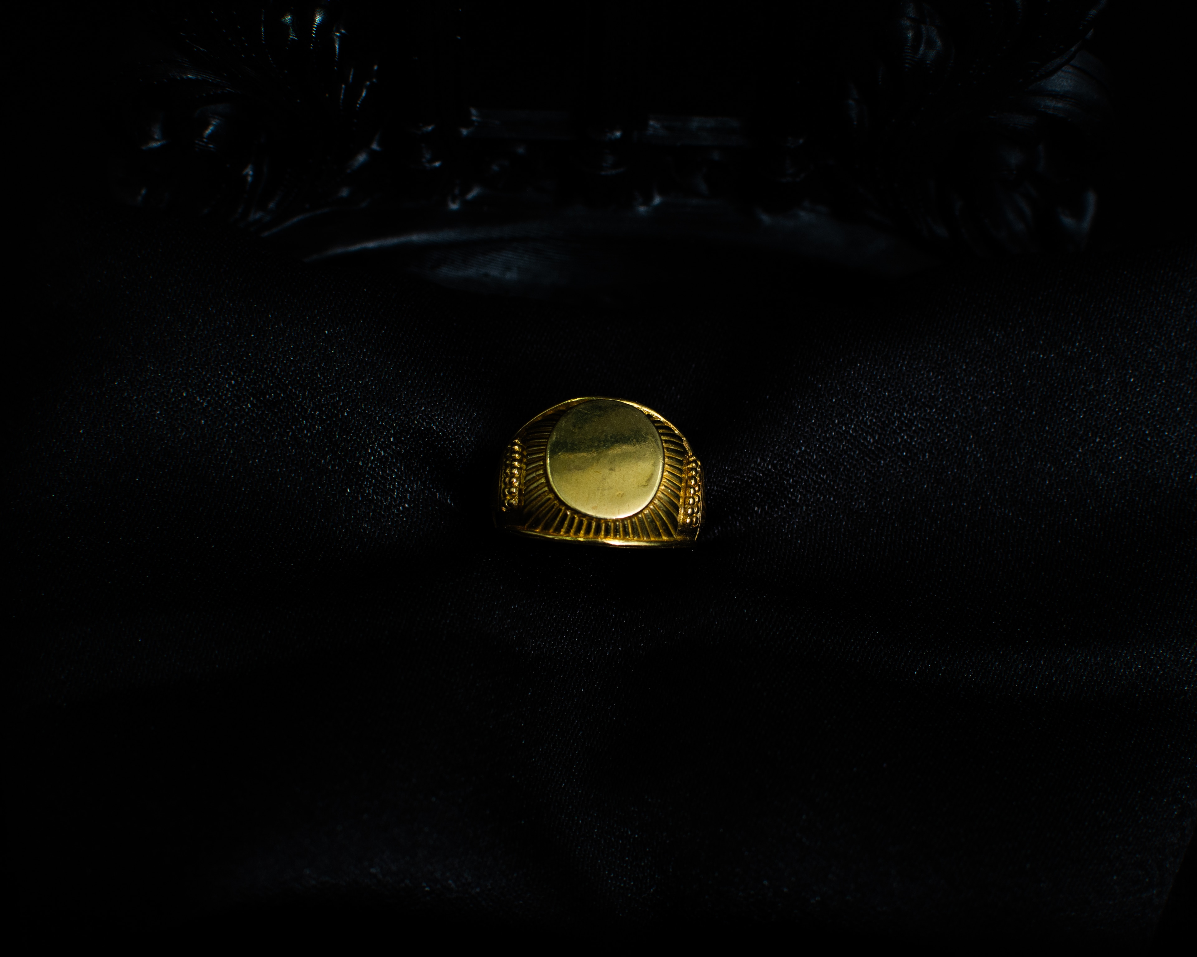 Panchadhatu Signet Ring 2 main view on black satin