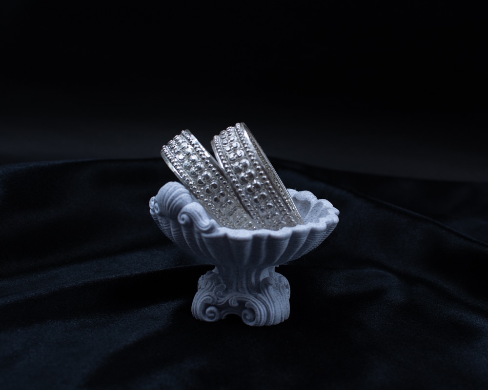 Silichung Bracelet pair on black display stand