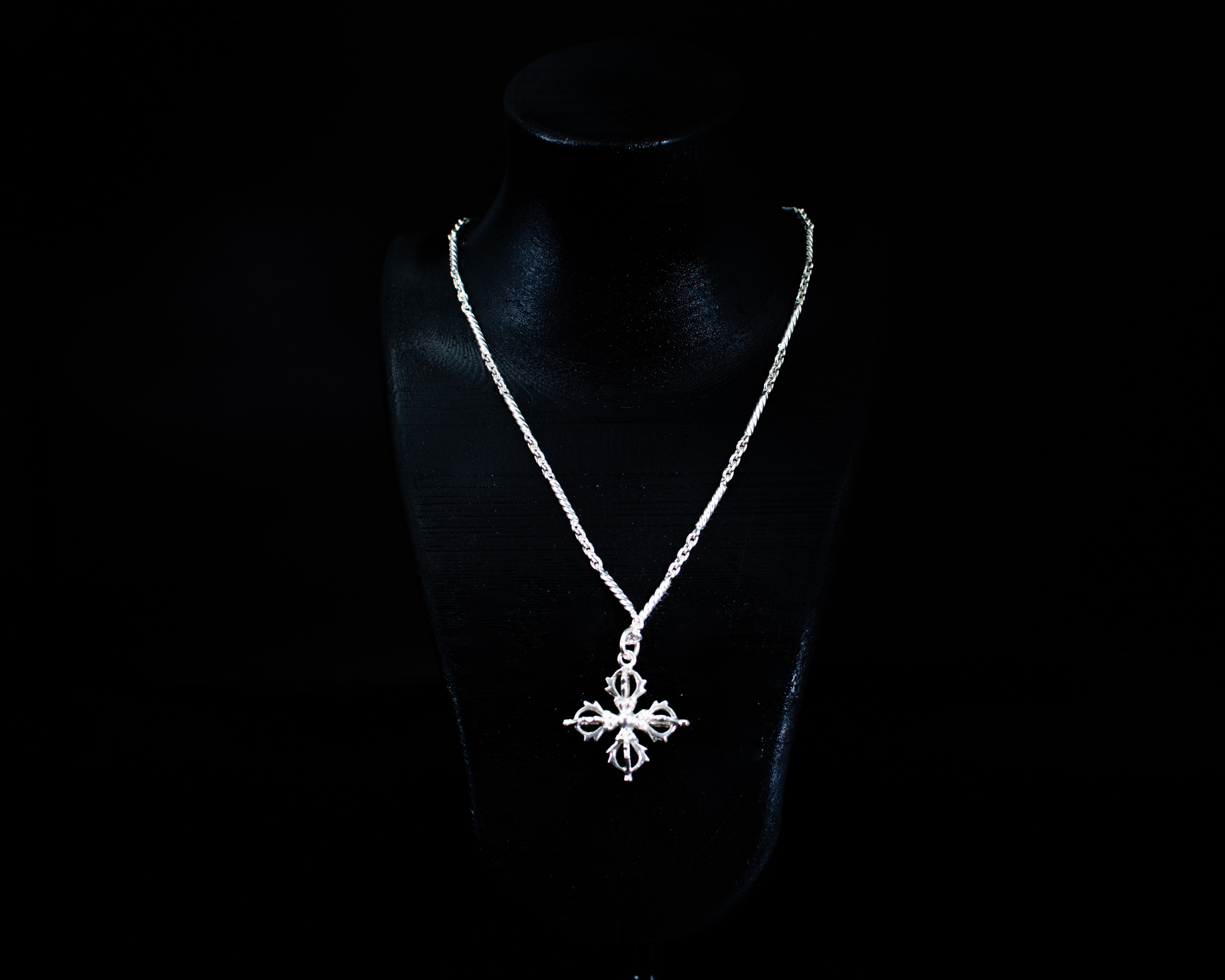 The Vishvavajra Pendant close-up on black display